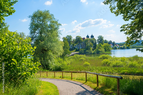 idyllic hiking destination, way around lake Seeoner See, view to cloister island, upper bavaria