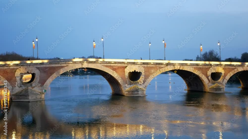 Panning view of the Pont Neuf bridge at sunset. Toulouse, France. Panning view of the Pont Neuf bridge at sunset. Toulouse, France.