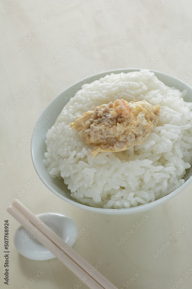 Homemade Chinese comfort. food, mince meat in steamed egg with rice Homemade Chinese comfort. food, mince meat in steamed egg with rice
