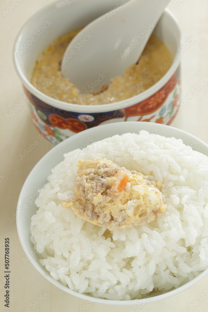 Homemade Chinese comfort. food, mince meat in steamed egg with rice Homemade Chinese comfort. food, mince meat in steamed egg with rice