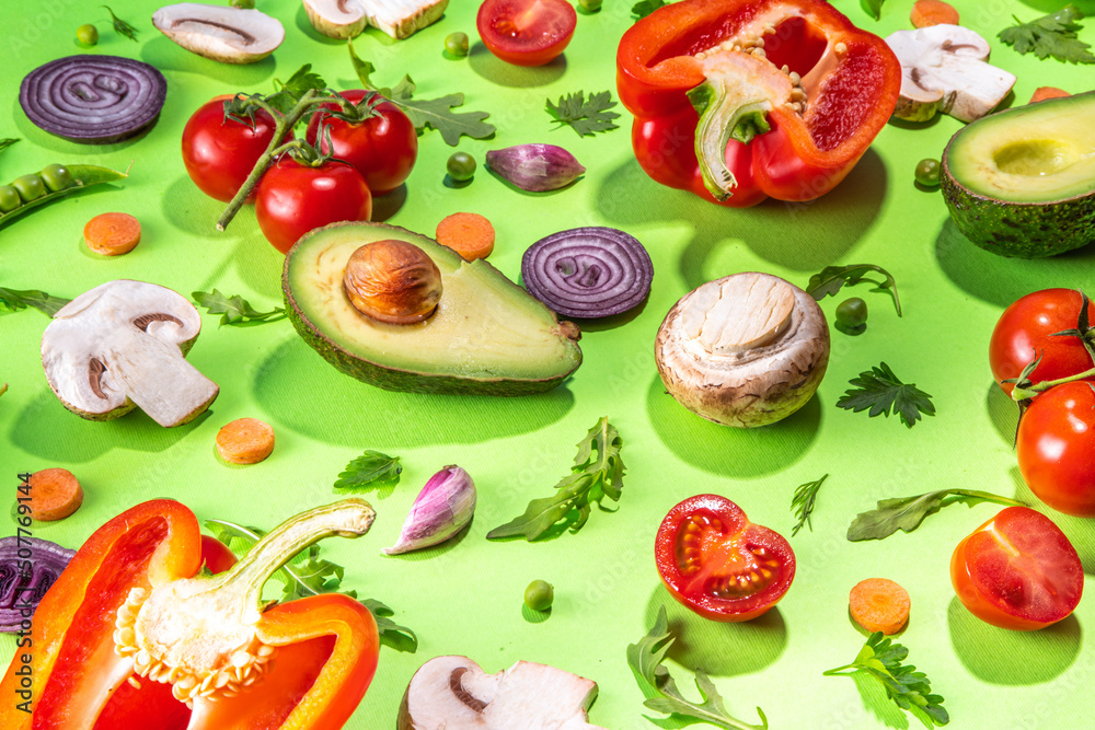 Various fresh vegetables pattern. Raw organic vegetables, salad ingredients bright flatlay on light green background. Healthy diet common diet, vegan vegetarian foodcooking background copy space Various fresh vegetables pattern. Raw organic vegetables, salad ingredients bright flatlay on light green background. Healthy diet common diet, vegan vegetarian foodcooking background copy space