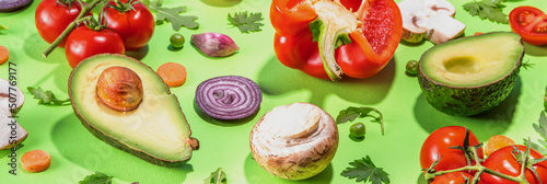 Various fresh vegetables pattern. Raw organic vegetables, salad ingredients bright flatlay on light green background. Healthy diet common diet, vegan vegetarian foodcooking background copy space