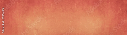 Abstract pastel peachy orange watercolor painted paper texture background banner panorama..