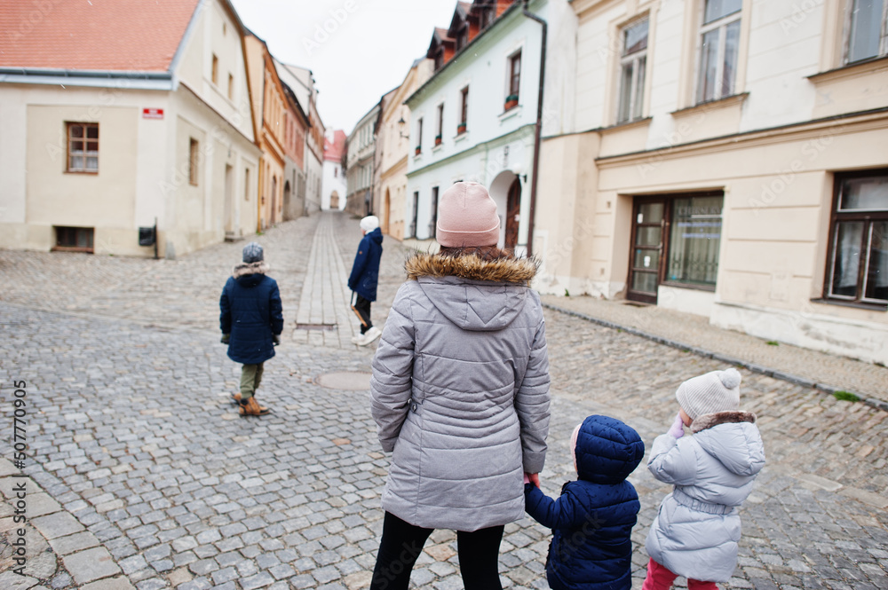 Mother with kids walking old town Znojmo in the South Moravian Region of the Czech Republic.