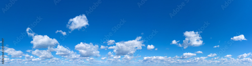 Fototapeta premium Blue Sky background with tiny Clouds. Panorama background