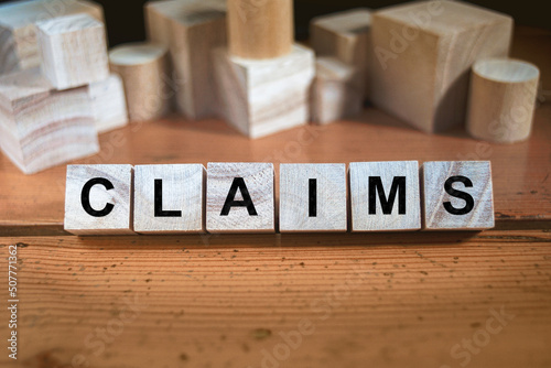 Claims Word In Wooden Cube