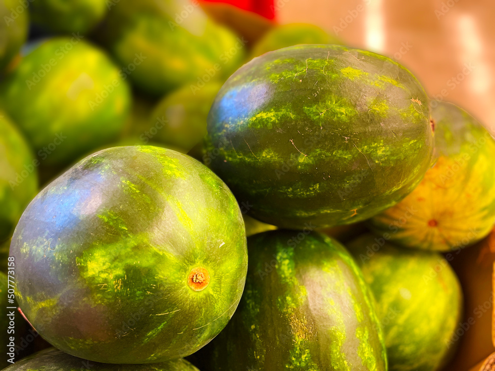 Retail store produce watermelons on display Retail store produce watermelons on display