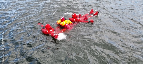 Delegates do practical exercises during a training session on Sea Survival