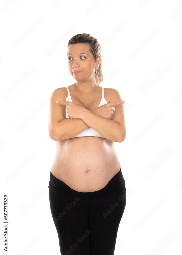 Fototapeta premium Image of pregnant woman touching her belly with hands