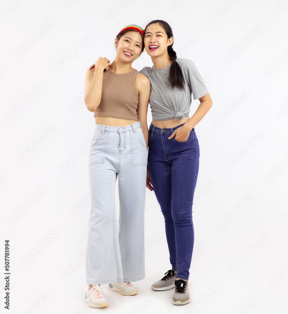 Two asian women lgbt couple isolated on white color background. love pride month concept Two asian women lgbt couple isolated on white color background. love pride month concept