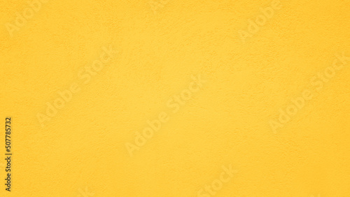 surface of grunge bright yellow concrete wall texture for abstract background
