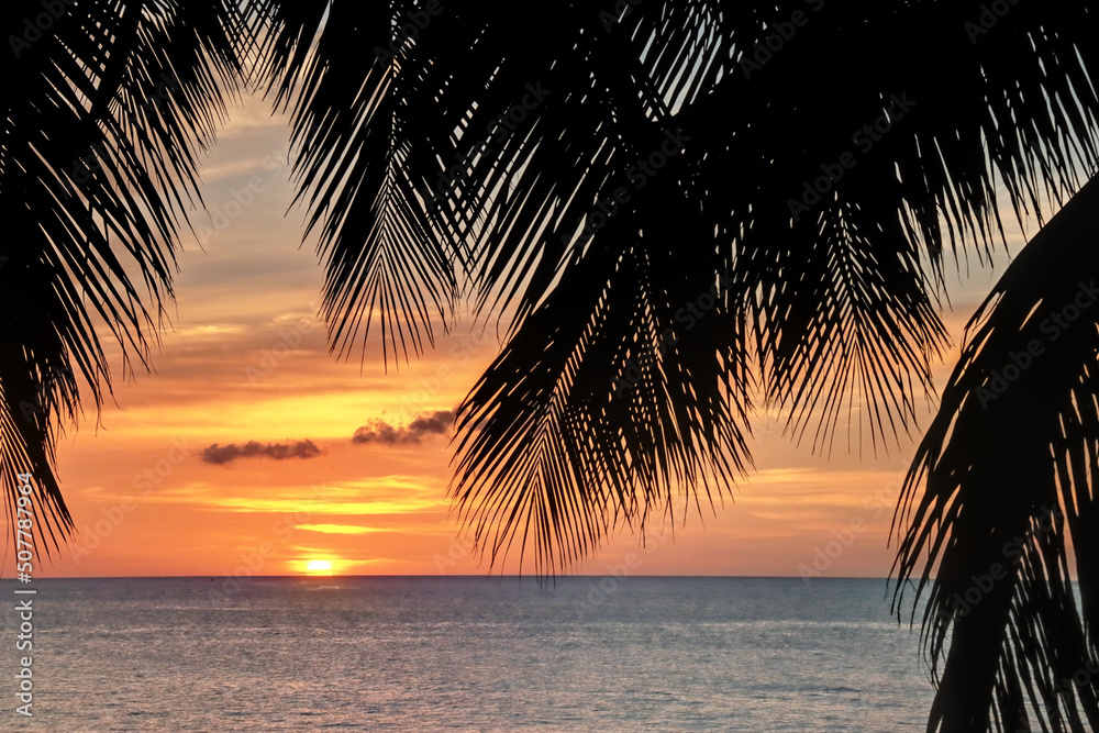 Coucher de soleil plage Leroux à Deshaies en Guadeloupe Antilles Française  Stock Photo | Adobe Stock