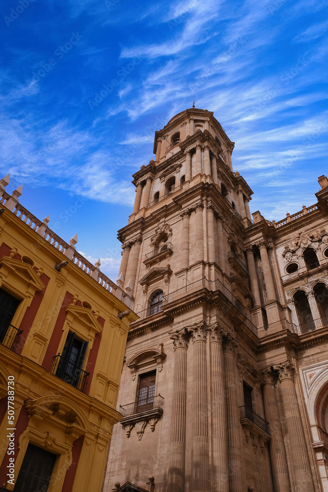 Symmetrical fragment of architecture of the Cathedral Tower. The Cathedral of Malaga is a national landmark. Old Town of Malaga, Andalusia, southern Spain, Europa.