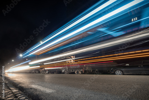 Canvas Print Cool long exposure cars traffic light trails, night view of the city of Rome, Italy