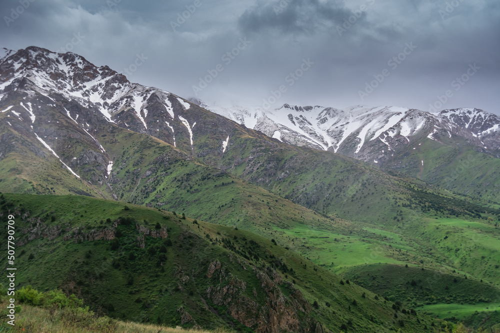 Landscape of mountains in rainy and cloudy weather in Kazakhstan.