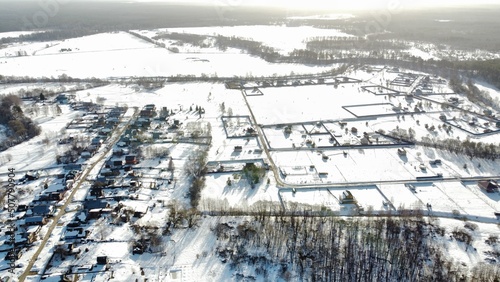 view from the height of the village with streets in winter. High quality photo