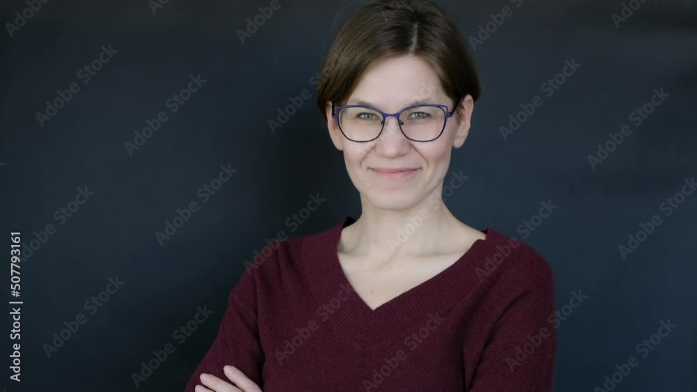 Pretty woman with brown hair smiling, looking to the camera, positive face Pretty woman with brown hair smiling, looking to the camera, positive face