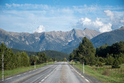 View of a mountain road on a sunny day in Les Angles, France.