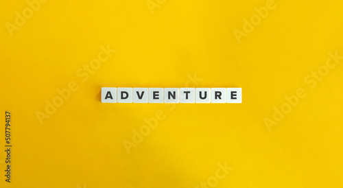 Adventure Word and Banner. Letter Tiles on Yellow Background. Minimal Aesthetics.