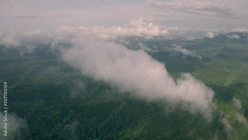 Video 4K, Aerial view Morning scenic on high mountains with electricity pylon Pang Puay, Mae Moh, Lampang, Thailand. Beautiful morning with golden sunrise and fog flowing. Video 4K, Aerial view Morning scenic on high mountains with electricity pylon Pang Puay, Mae Moh, Lampang, Thailand. Beautiful morning with golden sunrise and fog flowing.