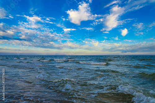 Evening sea beach  sand  blue sky. Marine relaxation landscape