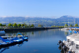 Dam at City of Rapperswil with Lake Zürich on a sunny spring day. Photo taken April 28th, 2022, Rapperswil-Jona, Switzerland.