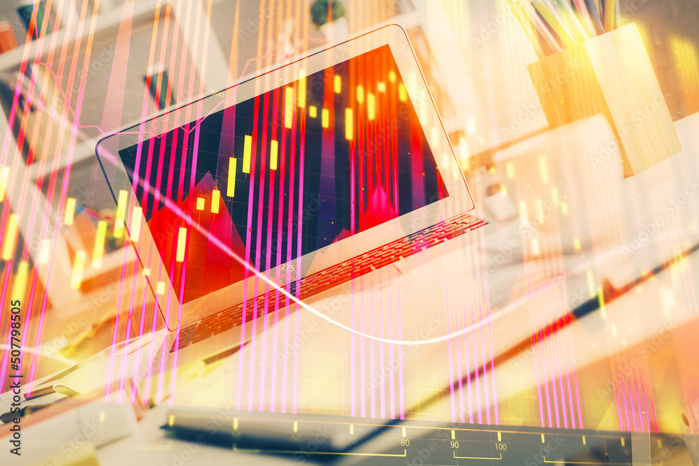 Obraz premium Forex market graph hologram and personal computer on background. Multi exposure. Concept of investment.
