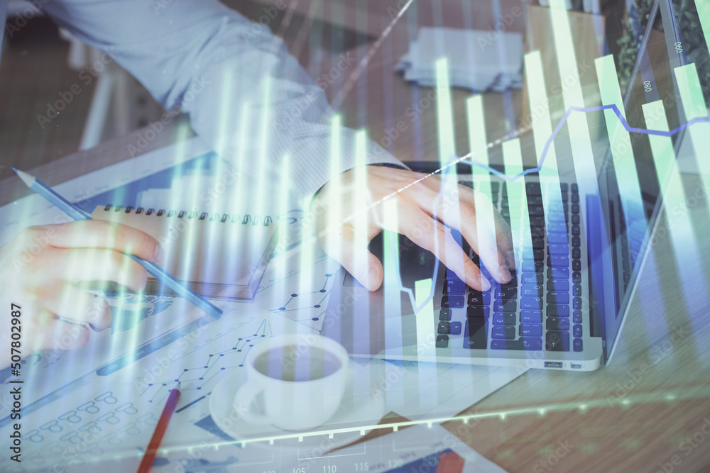 Forex graph with businessman working on computer in office on background. Concept of hardworking. Multi exposure. Forex graph with businessman working on computer in office on background. Concept of hardworking. Multi exposure.