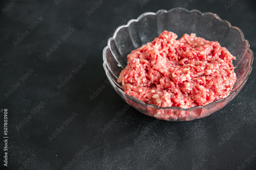 raw minced meat fresh beef, pork, lamb, chicken healthy meal food snack diet on the table copy space food background rustic top view raw minced meat fresh beef, pork, lamb, chicken healthy meal food snack diet on the table copy space food background rustic top view