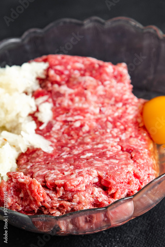 raw minced meat fresh beef, pork, lamb, chicken healthy meal food snack diet on the table copy space food background rustic top view