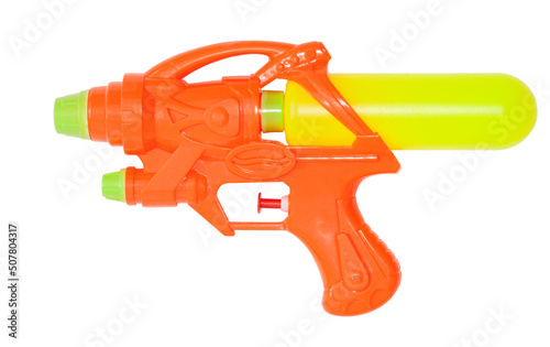 Plastic water gun on an isolated white background. Summer outdoor games by the pool or beach