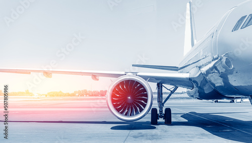 Airport banner, modern aircraft on airfield, blue color with sunlight photo