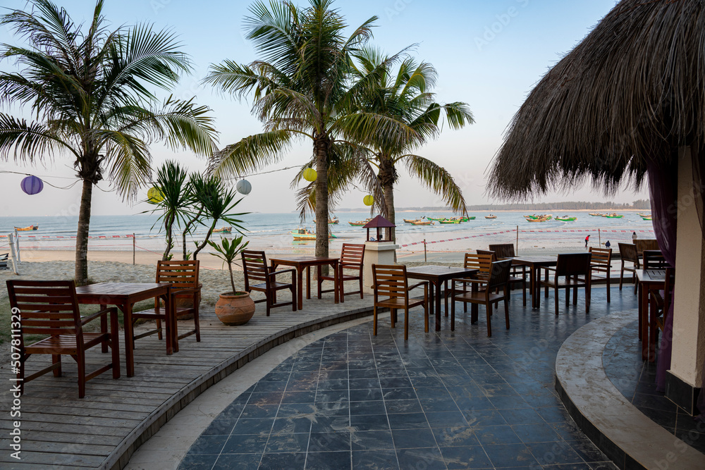 Relaxing tables and chairs by the sea