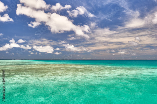Maldives paradise scenery. Tropical aerial landscape, seascape with long jetty, water villas with amazing sea and lagoon beach, tropical nature. Exotic tourism destination banner, summer vacation