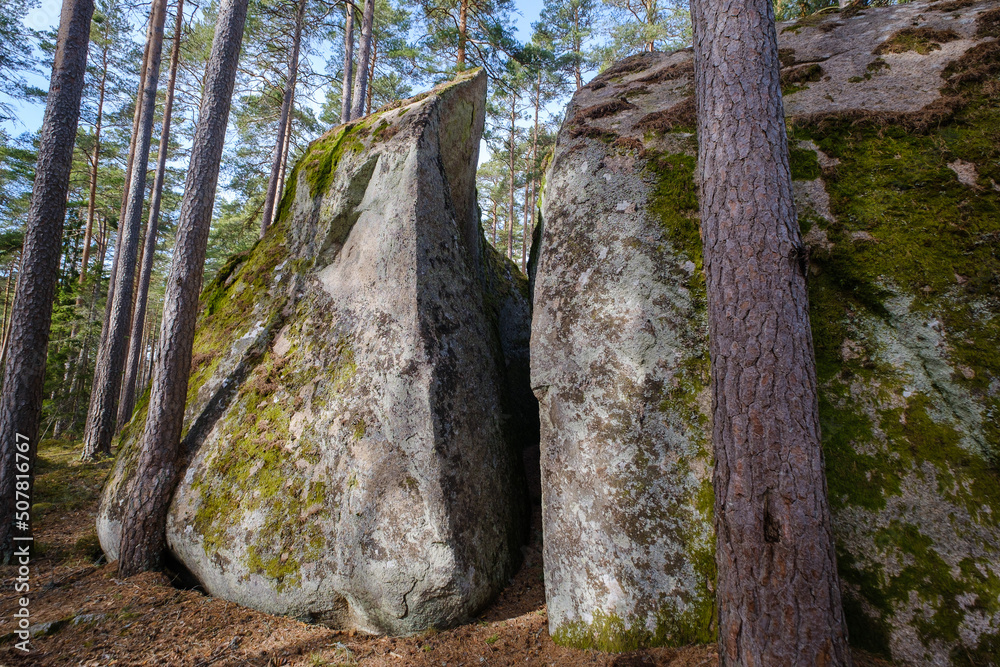 Klyvesten 14 m long granite boulder with a crack to walk through Klyvesten 14 m long granite boulder with a crack to walk through