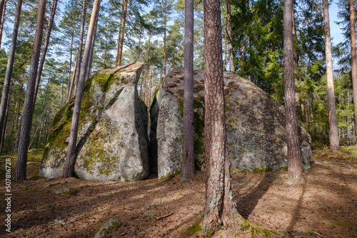 Klyvesten 14 m long granite boulder with a crack to walk through