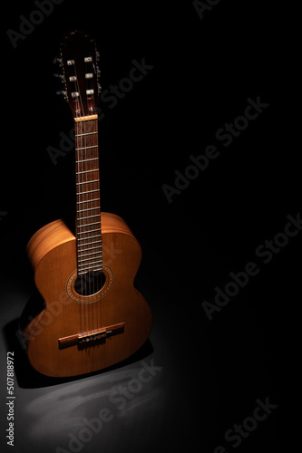 Classical guitar on a plain background with copy space