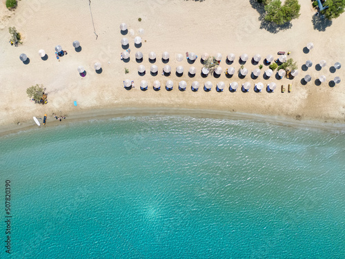 Fototapeta Naklejka Na Ścianę i Meble -  Aerial top view of the turquoise colored sea at Galissas beach, Syros island, Cyclades, Greece