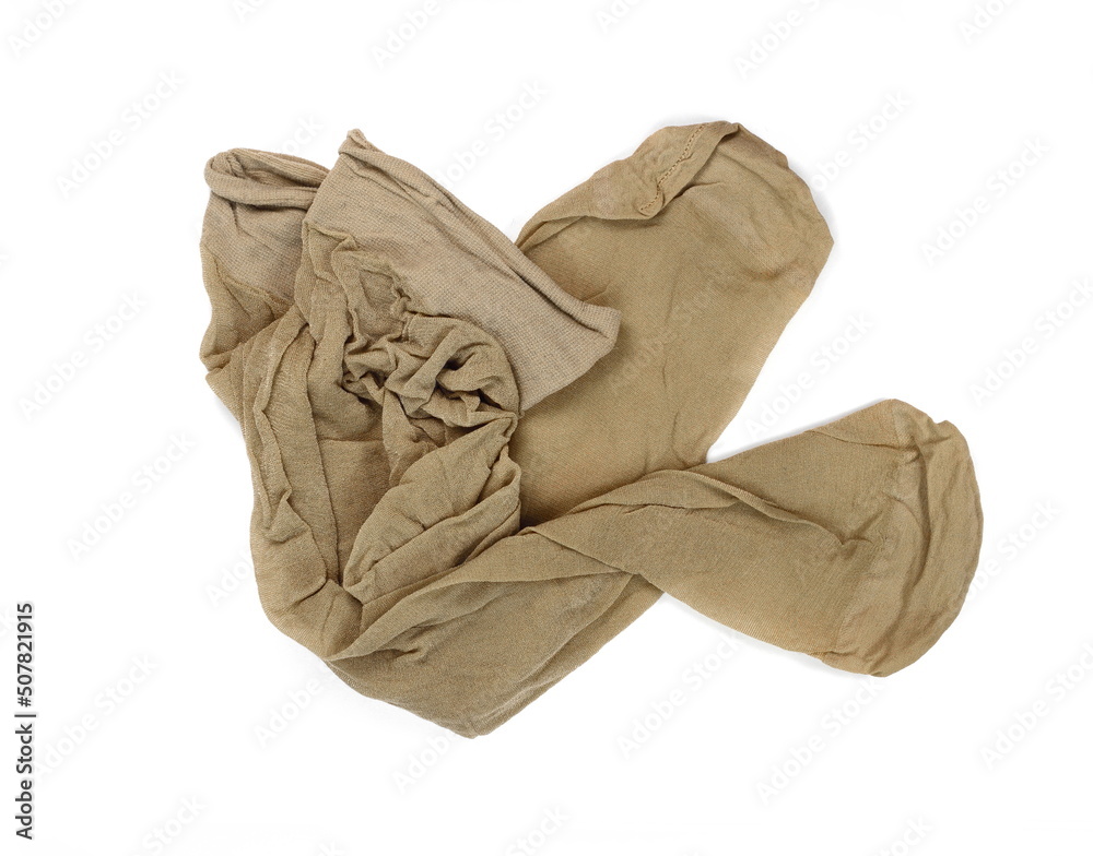 Women's nylon tights body color isolated on white background. Women's nylon stockings beige color. Women's nylon tights body color isolated on white background. Women's nylon stockings beige color.