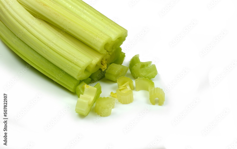 heap of sliced celery, isolated on white background heap of sliced celery, isolated on white background