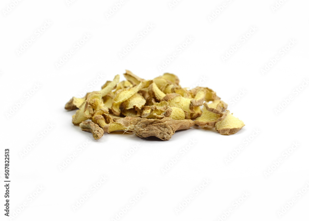 pile of dried ginger slices isolated on white background