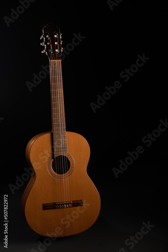 Classical guitar on a plain background with copy space