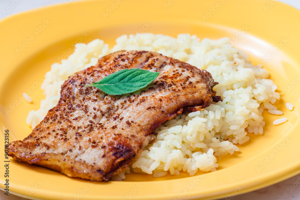 white fish on cumin served with rice white fish on cumin served with rice