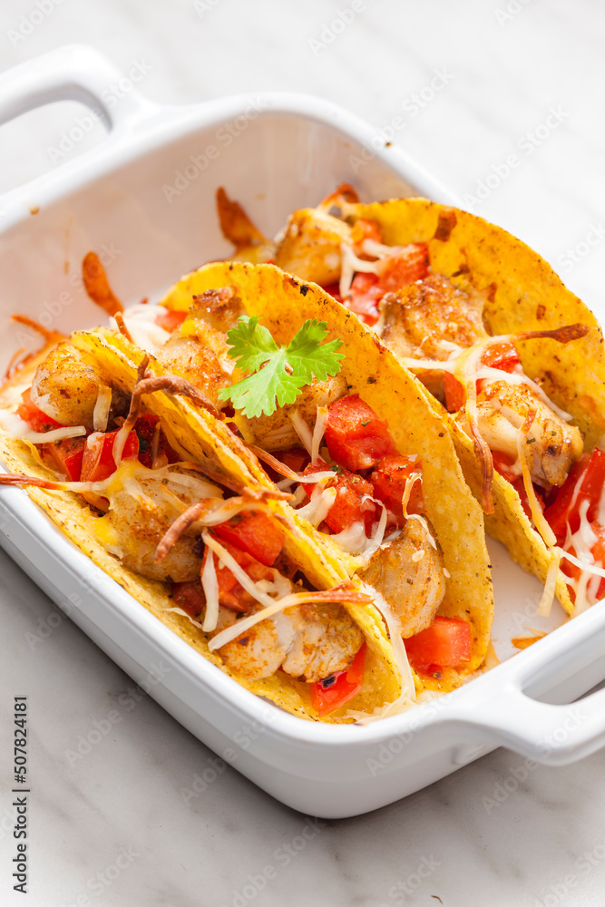 tacos filled with grilled chicken meat and tomatoes tacos filled with grilled chicken meat and tomatoes