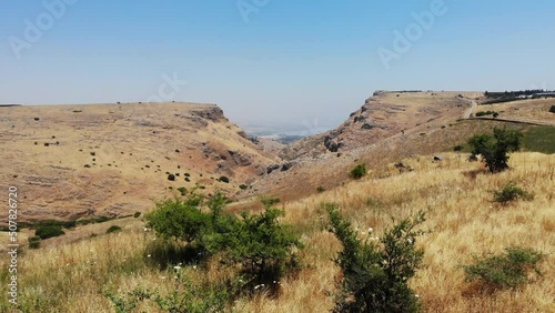 Cinematic drone aerial of Arbel Mountain cliffs