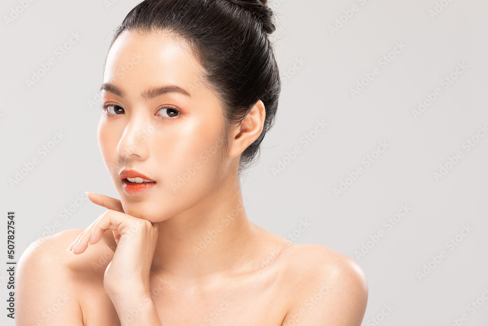 Beautiful Asian young woman touching chin smile with clean and fresh skin Happiness and cheerful with positive emotional,isolated on white background,Beauty Cosmetics and spa Facial treatment Concept Beautiful Asian young woman touching chin smile with clean and fresh skin Happiness and cheerful with positive emotional,isolated on white background,Beauty Cosmetics and spa Facial treatment Concept