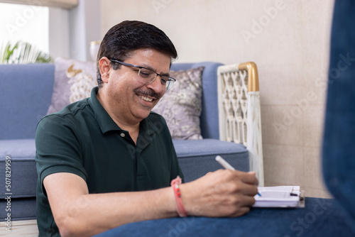 Photography Mature man working from home
