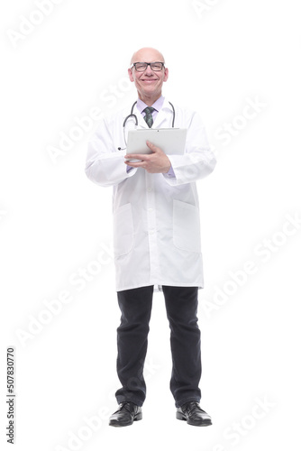 smiling doctor with a digital tablet. isolated on a white