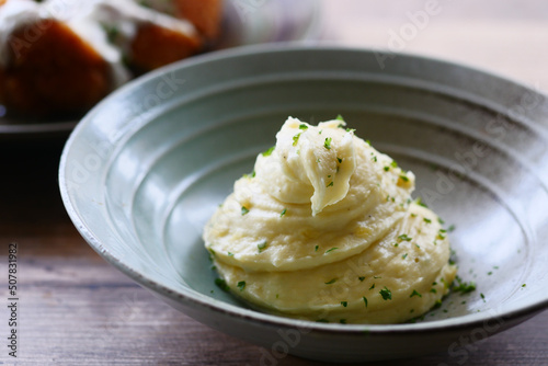 Photography Mashed potatoes in bowl on wooden rustic table