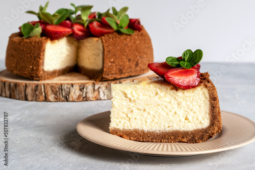 New York cheesecake is a dessert that is an open pie or even a cake. Decorated with strawberries. It consists of two main parts: sand base and cheese filling.